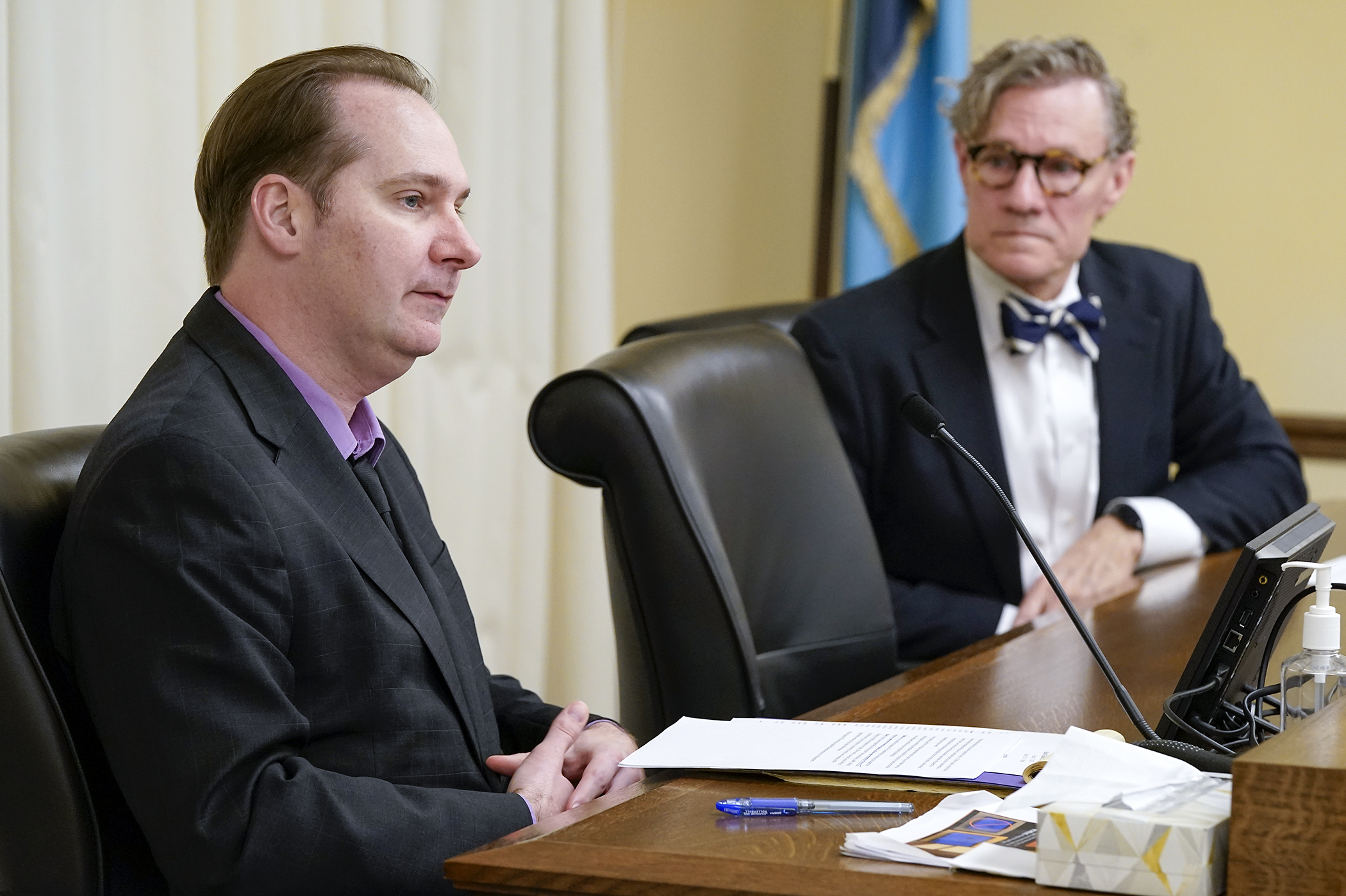 Robert Freeman, vice president of public policy for the Minnesota/North Dakota Chapter of the Alzheimer’s Association, testifies March 17 in support of HF794. Sponsored by Rep. Danny Nadeau, right, the bill would establish a dementia services program. (Photo by Michele Jokinen)